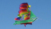 link to photo of kite resembling multicolor sailing ship